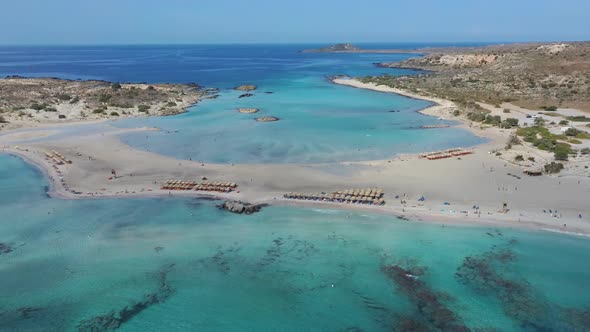 Aerial view: paradise vacation. Turquoise sea at Elafonisi, Crete. Idyllic place