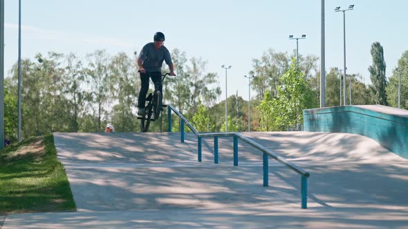 Sliding On The Railing In Park