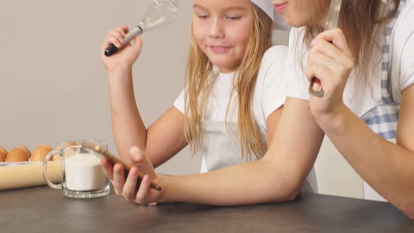 Thoughtful Family of Chefs Decides What To Cook for Dinner