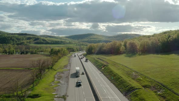 Aerial Above Drone View of Flight Over the Highway with Many Cars and Trucks