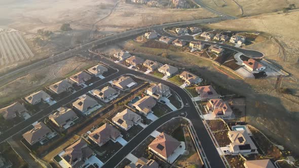 Flying over a typical California residential area during the golden hour.