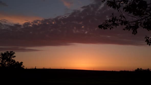 Time lapse The movement of clouds at sunset.