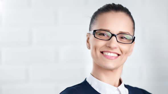 Medium Closeup Happy Stylish Business Woman Wearing Glasses Smiling and Posing