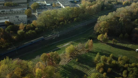 Railway line. Flying at dusk at sunset. Aerial photography.