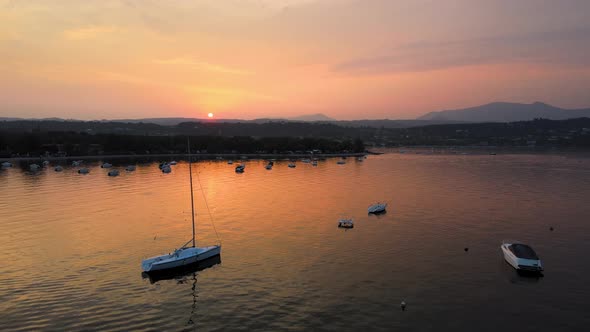 Aerial View of Idyllic Sunset Above Lago di Garda and Sato City Lombardy Italy, Serene Lakefront and