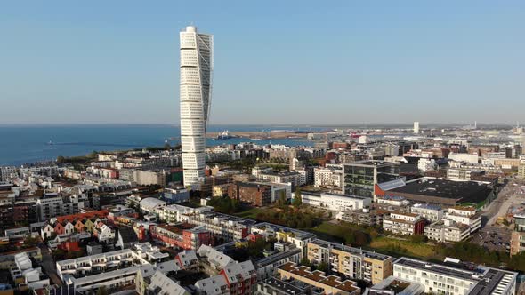 Flying towards turning torso, Malmö, Sweden, late summer evening time
