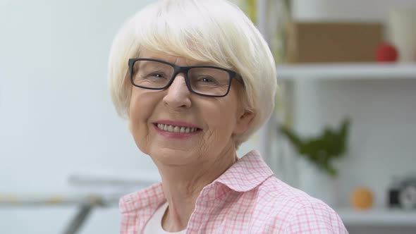 Smiling Old Woman in Eyeglasses Looking at Camera, Vision Treatment, Health Care