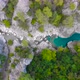 Flight Over a Mountain River and a Trail to a Gorge Among a Coniferous Forest - VideoHive Item for Sale