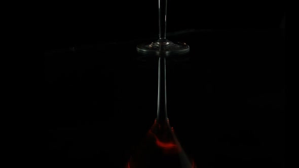 Fire blowing out of martini glass, Slow Motion