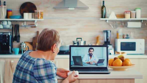 Elderly Woman on Telemedicine with Doctor