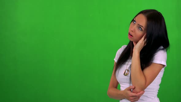 Young Pretty Woman Is Bored - Green Screen - Studio