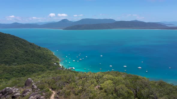 Fitzroy Island summit lookout aerial with ocean, boats and landscape, Queensland, Australia