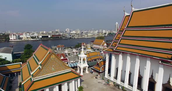Aerial shot of Wat Kalaya and revealing the Bangkok Skyline.