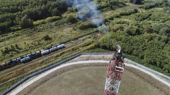 A Tower for Flaring Associated Gas at a Petrochemical Plant. Fiery Torch.