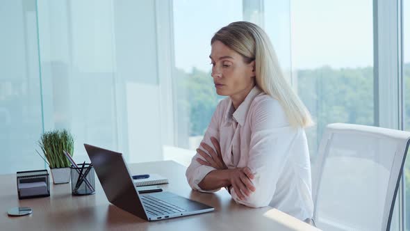 Portrait of Female Concentrated Employee