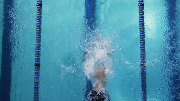 Swimmer training in a swimming pool