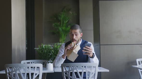 Young professional man in a cafe