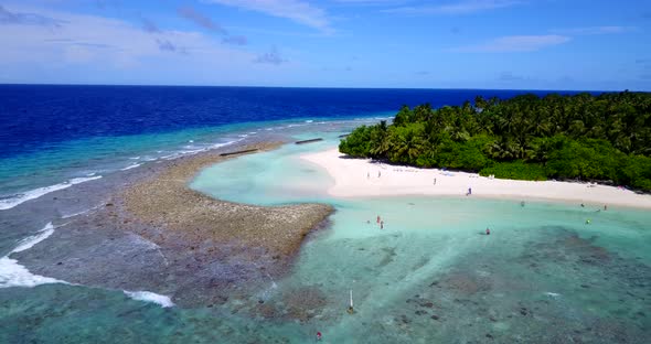 Tropical drone travel shot of a summer white paradise sand beach and aqua turquoise water background