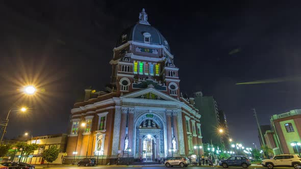 Exterior of the Immaculate Heart of Mary Church Illuminated at Night Timelapse Hyperlapse