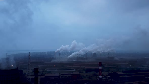 smoke from a factory. industry metallurgical plant dawn smoke smog emissions bad ecology aerial view