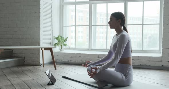 Professional Yoga Practitioner Lady in Grey Sports Suit