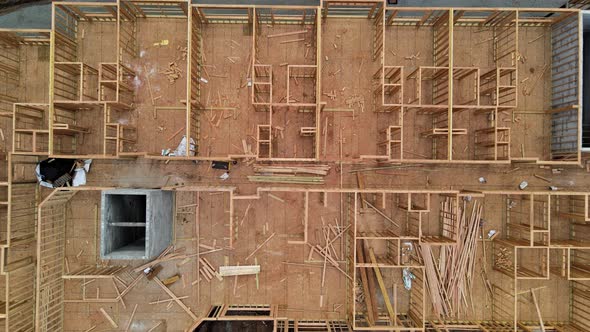 Construction Site with Wooden Framework of Urban Apartment Complex