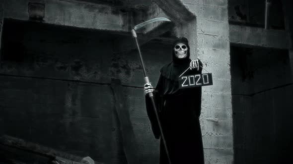 Death with a Scythe Raises a Sign with the Inscription 2020