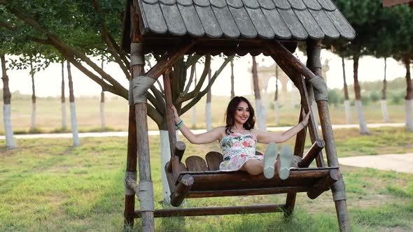 Woman Swinging On a Swings