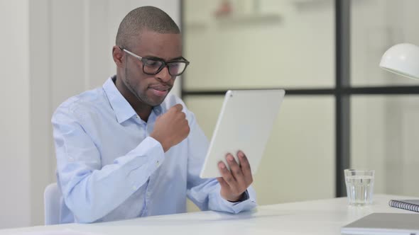 African Man Using Tablet Work