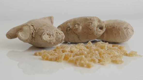 Fresh and candied  ginger root on the table slow tilt 4K 2160p 30fps UltraHD footage - Crystallized 