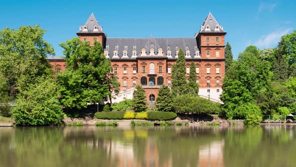 Turin, Italy. Zoom out Time Lapse Video of a view of the Valentino Castle on the Po River.