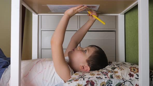 Stayathome Concept. Child Hands Drawing Upside Down. Quarantine and Children. Indoor Activity