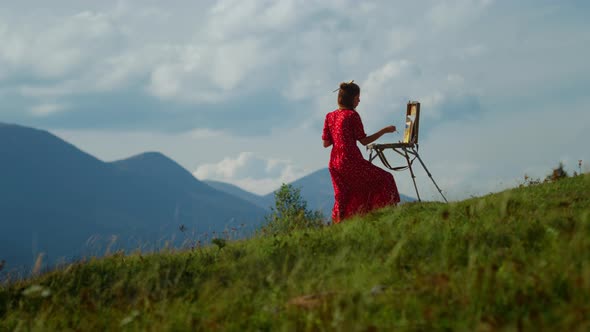 Unknown Woman Artist Drawing Outdoors