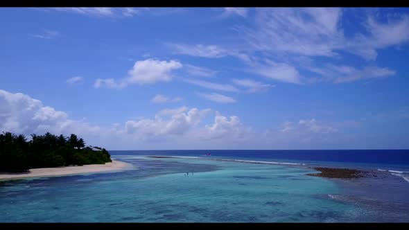 Aerial sky of marine bay beach trip by blue ocean with white sand background of a daytrip near waves