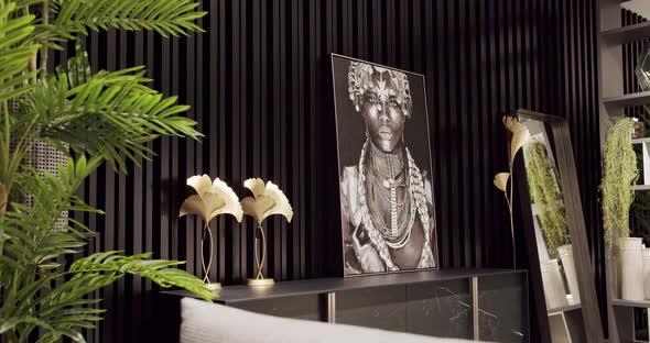 Accessory in Beauty Interior with Minimalist Black Wood Lines and Palm Decor