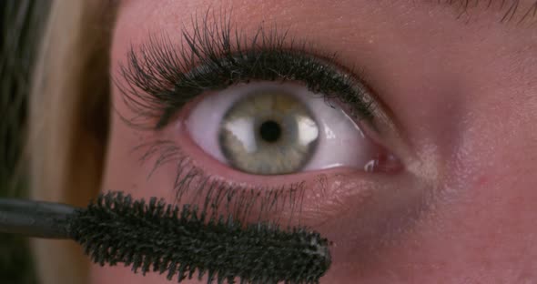 Woman Using Mascara Brush