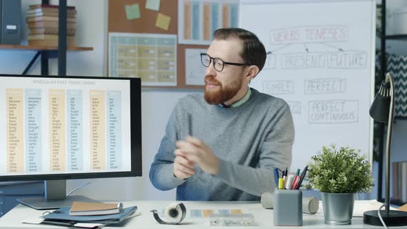 Portrait of Young Man English Teacher Recording Lesson for Internet Vlog alt