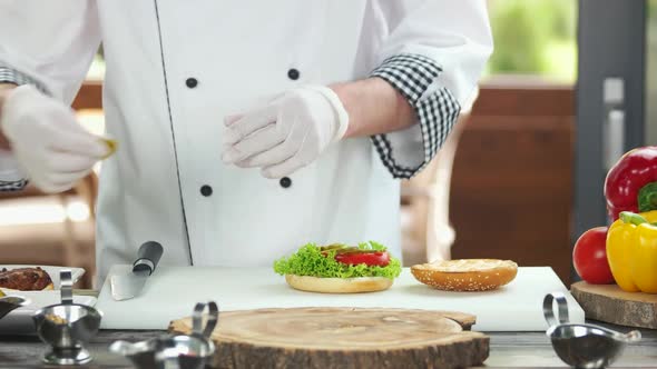 Chef Making Delicious Burger