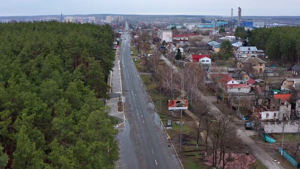 Top view of the road. Aerial view of the destroyed and burnt houses.