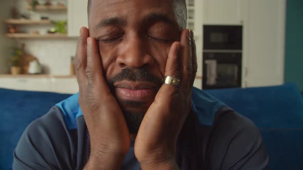 Closeup Portrait of Male African American Sports Fan Expressing Frustration