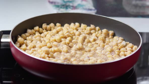 Raw Chickpeas Flooded with Water