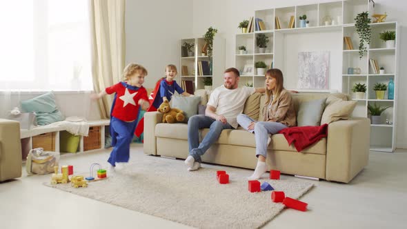 Parents Having Fun Together with Kids