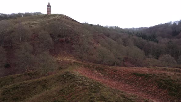 Aerial of a Tourist Hiking Along the Hills in Himmelbjerget Area Denmark