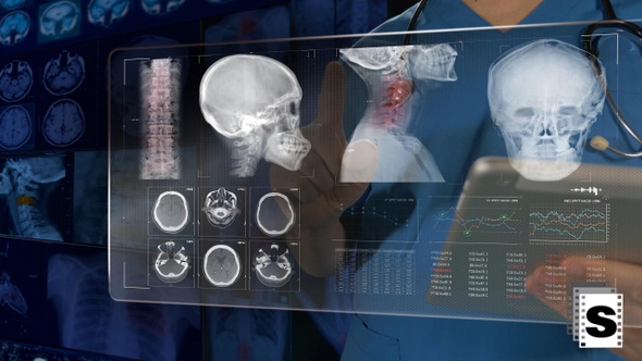 Doctor Looking Medical Monitor alt