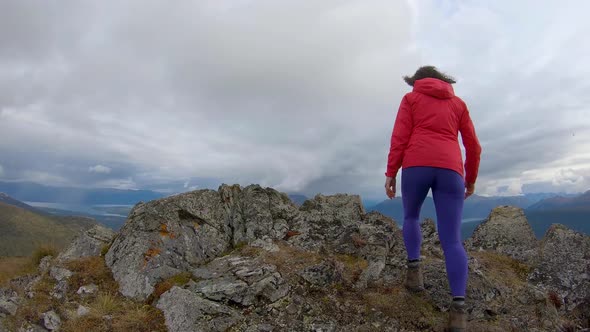 Adventurous Girl Hiking Up Nares Mountain