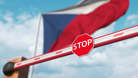 Opening Boom Barrier with Stop Sign Against the Czech Flag