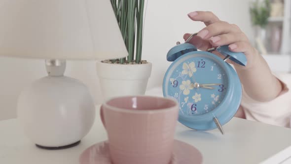 Blue Old-fashioned Alarm Clock Ringing in the Morning
