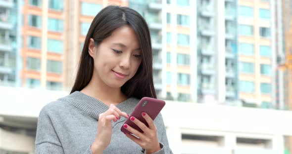 Woman use of mobile phone