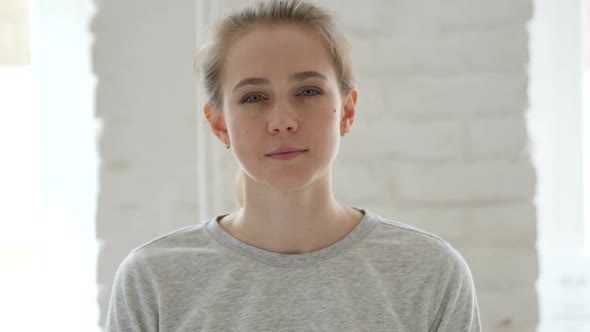 Portrait of Serious Young Woman