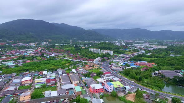 Aerial Drone video hyperlapse of road and kathu city Phuket thailand transportation footage backgrou